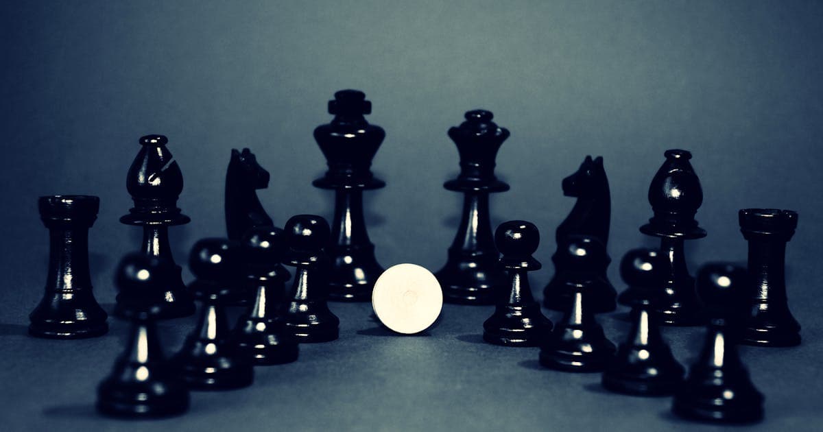 Chess pieces in dramatic close-up representing strategic opening sequences