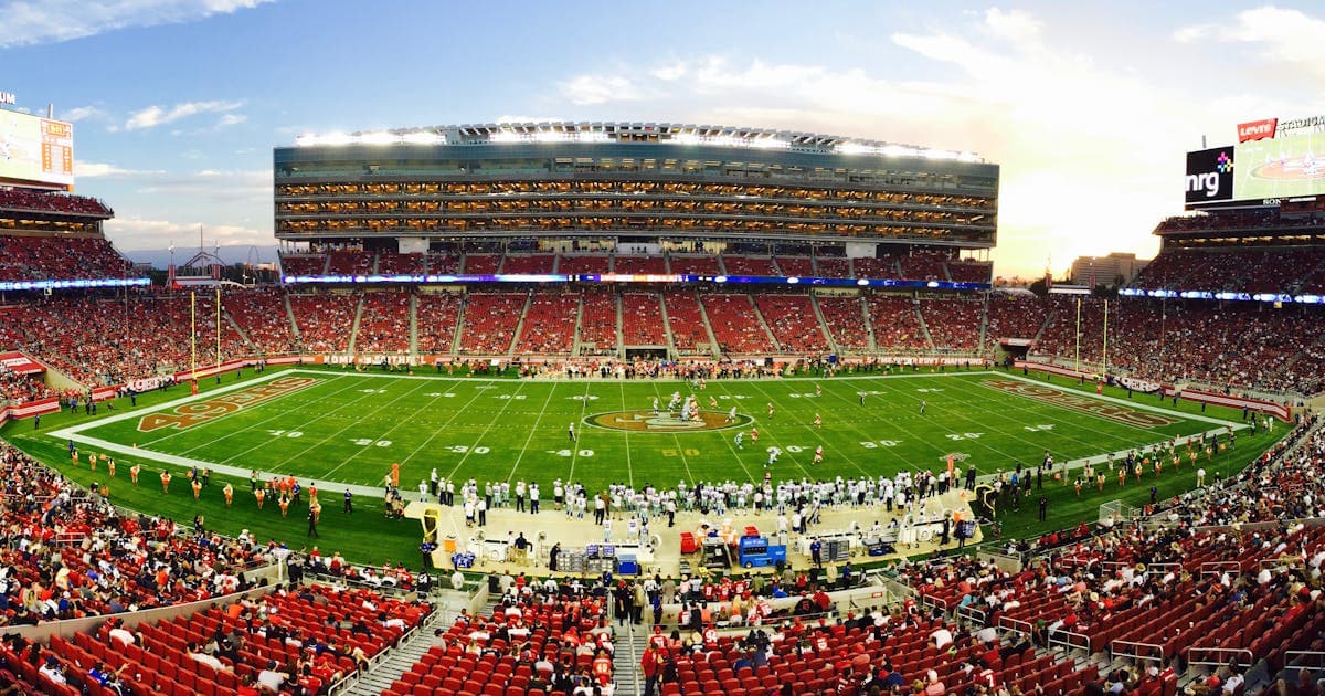 Packed stadium filled with spectators watching a championship event